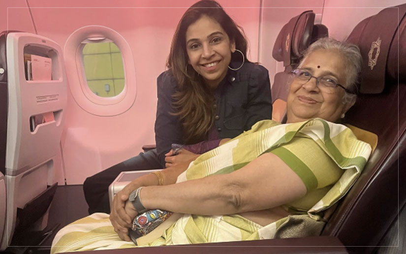 Sudha Murthy and Anisha Singh in conversation during a flight, exchanging insights on life, purpose, and women’s progress.